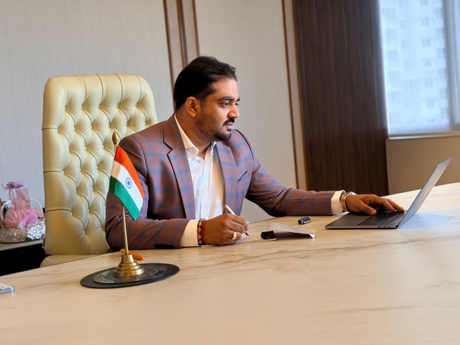 Kaushik Kothiya at his desk