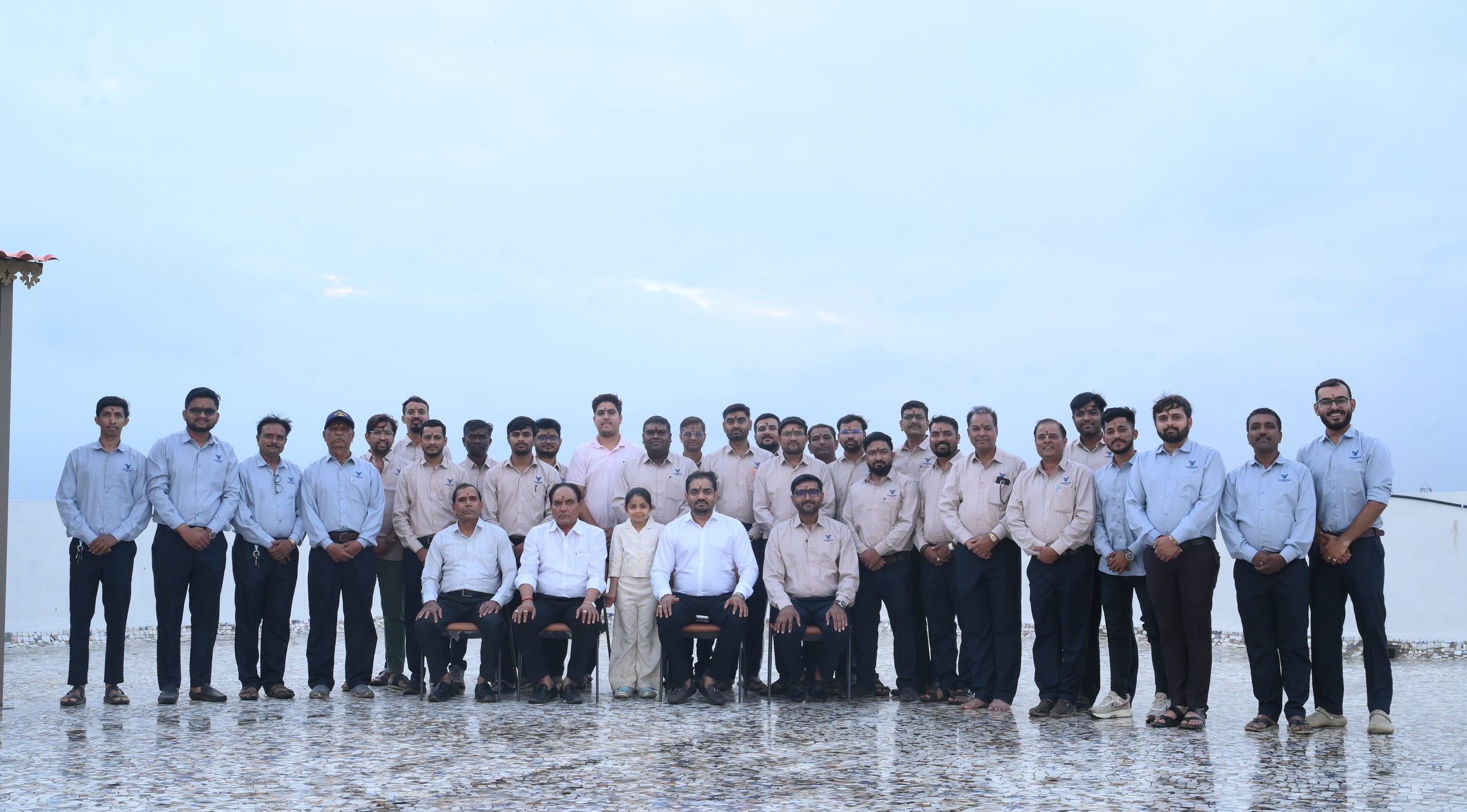 The Yogeshwar Group team on the roof of a Shivalik building