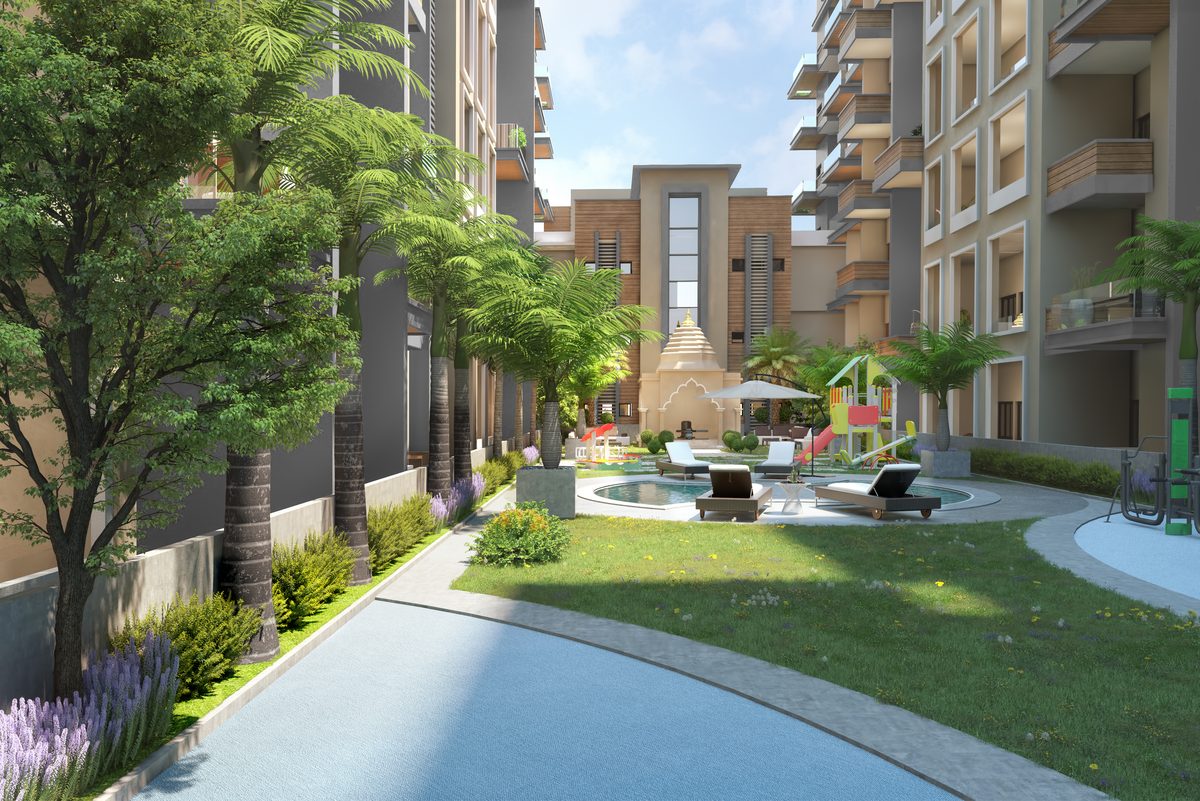 Garden path at Shivalik Shivanta leading past lawns and loungers to the play area and temple, architect's render