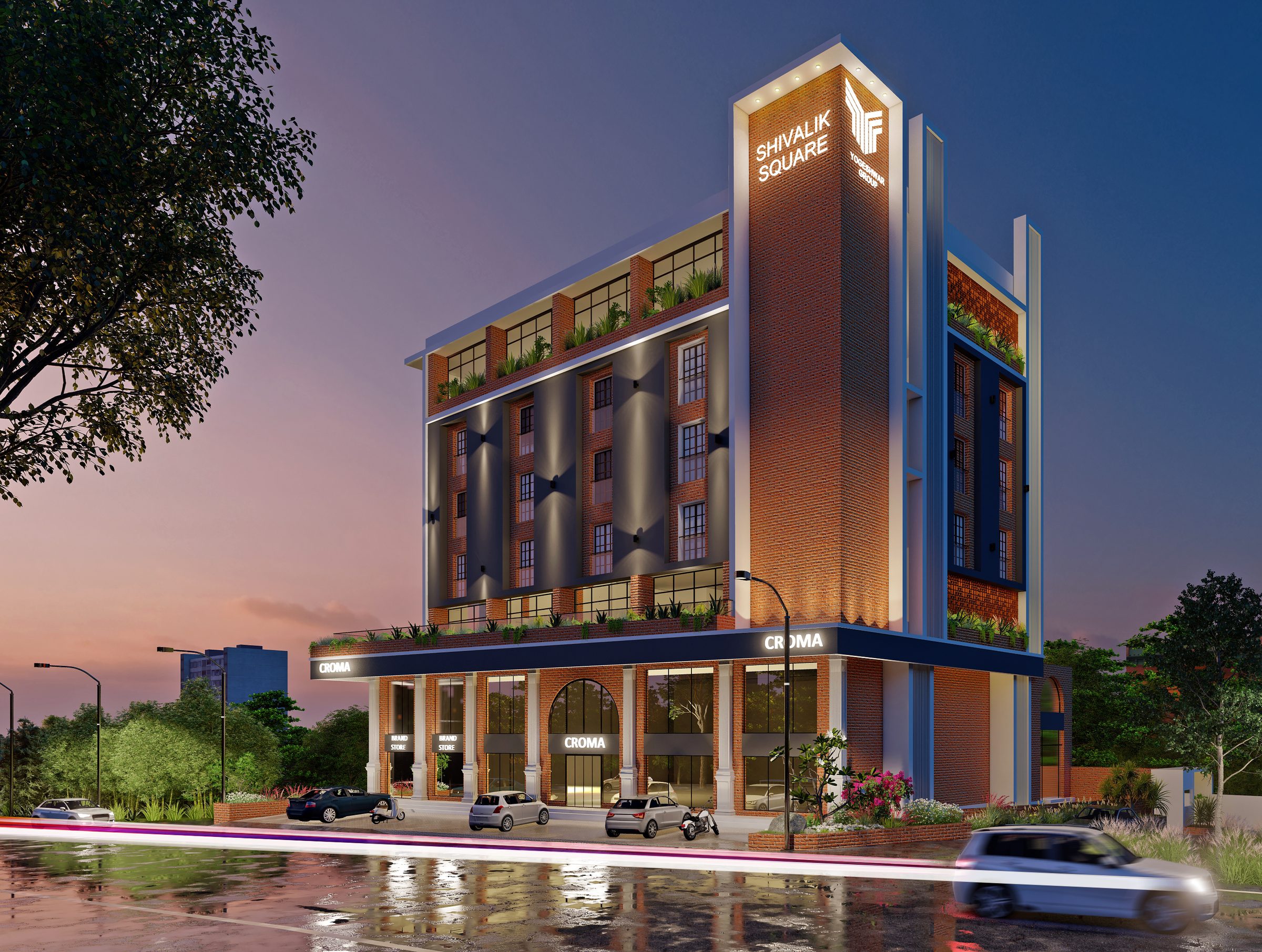 Shivalik Square at dusk: a brick and dark-panel building with a tall name pylon, planted terraces and a colonnaded double-height showroom floor at street level, architect's render