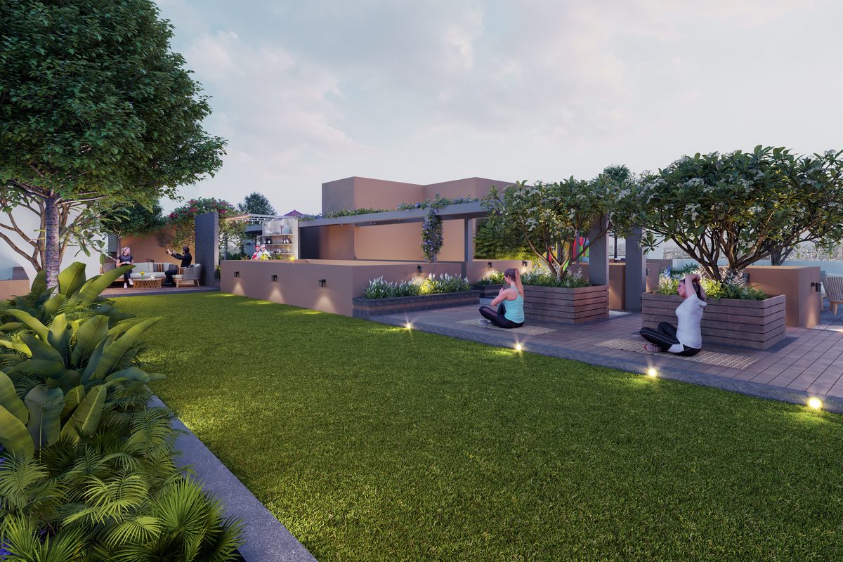 Residents doing yoga on a deck beside the terrace lawn at dusk, with lounge seating behind, Shivalik Status, architect's render